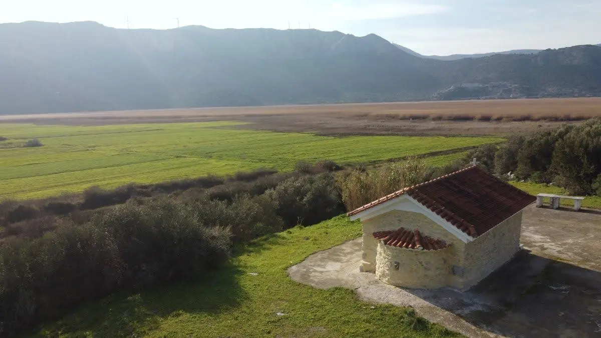 The church of Saint George at the shore of dystos lake and by the trailhead to ancient dystos