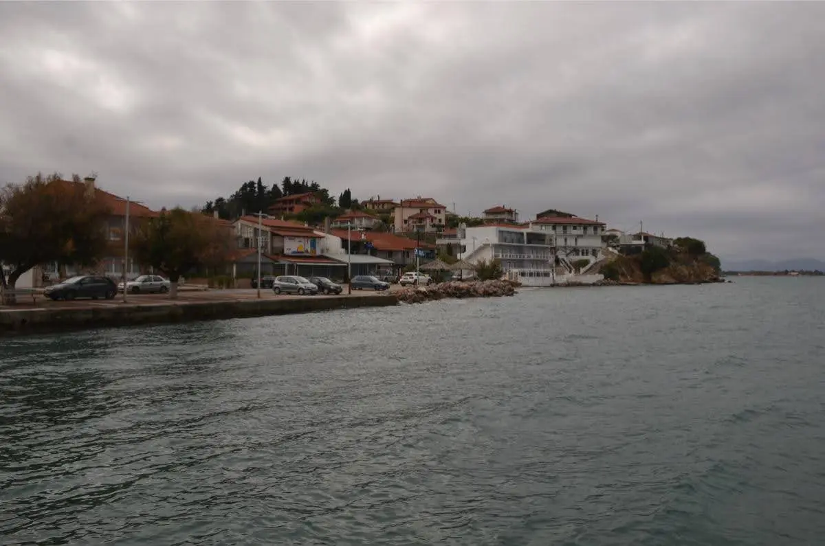 The waterfront of asminio village in evia in a cloudy day