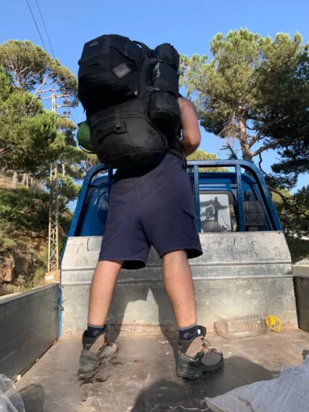 hitchhiking in pickup truck bed
