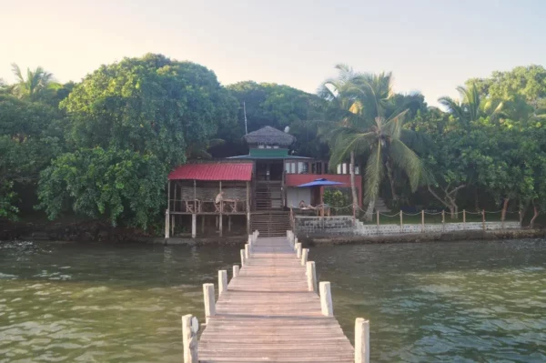Wooden pier leading to Boraha Village Ecolodge on the east coast of Sainte Marie Island, Madagascar.