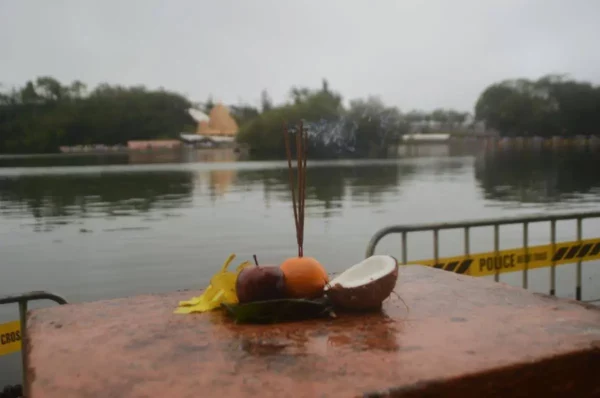 fruit and incense offerings at shiva festival in grand bassin lake, mauritius