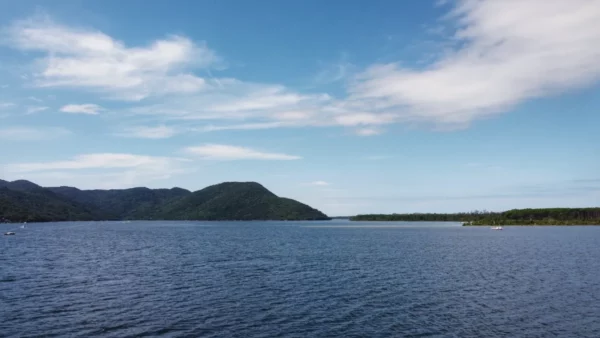 conceicao lagoon in florianopolis under a blue sky
