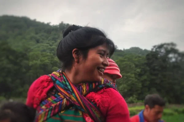 mam maya woman with a baby on her back