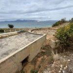Base of big gun overlooking the Gulf of Artemision at world war 2 fortifications of metaxa on north coast of evia