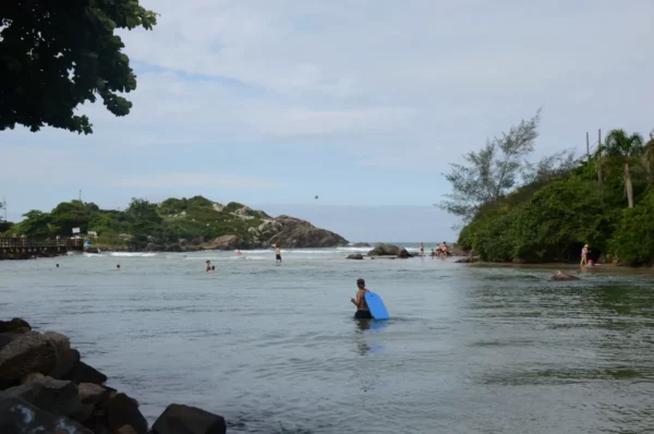 Swimming in the river between the beaches of Armação and Matadeiro