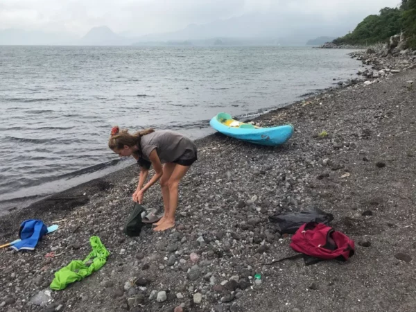kayaker at playa la finca near san pedro la laguna at lake atitlan