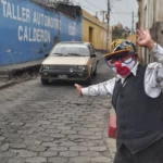 Volunteer traffic controller/clown at a junction in Xela