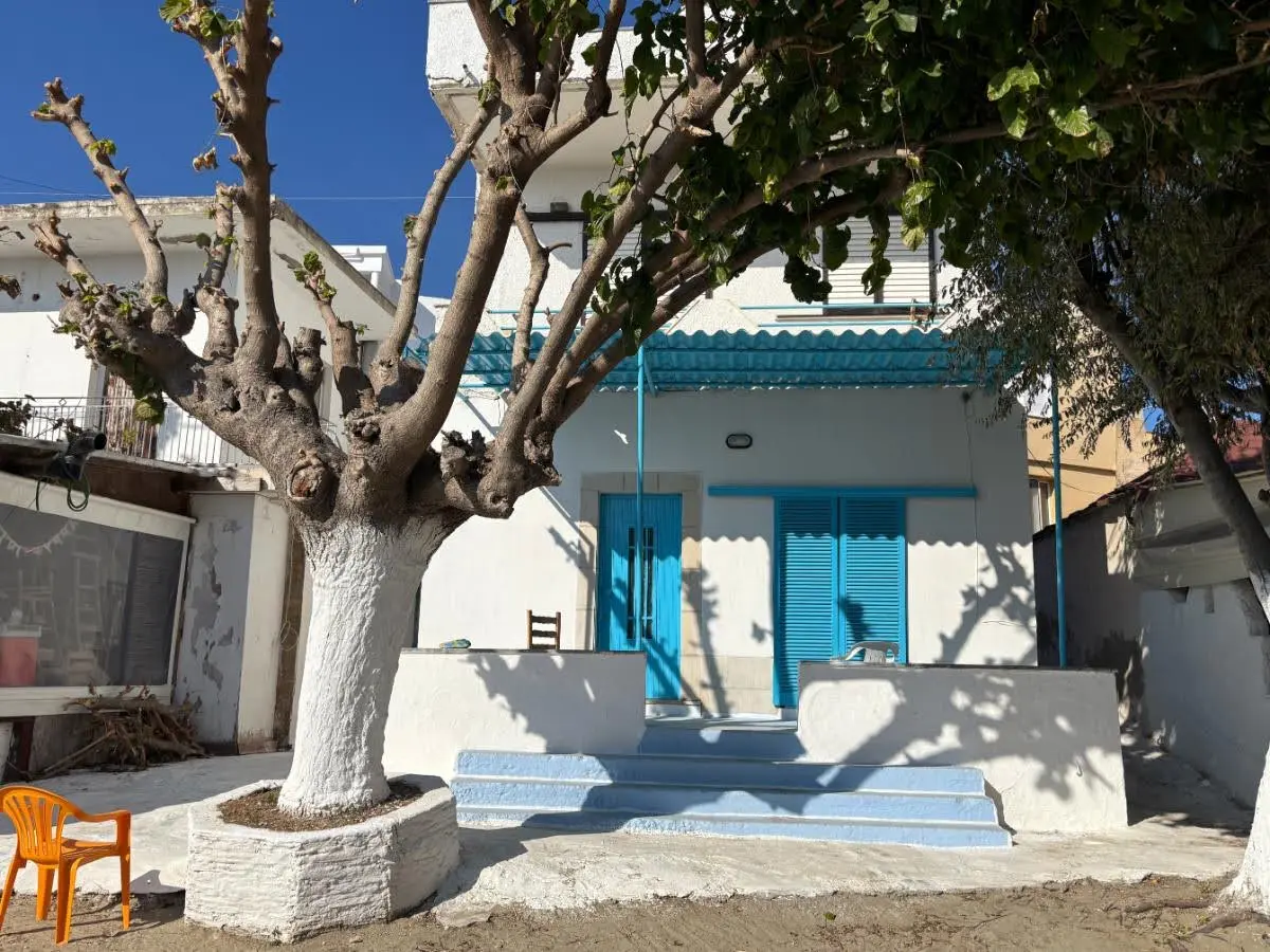 Cute blue and white greek village house 