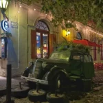 Antique car turned planter/tourist magnet outside of vintage restaurant in central Colonia del sacramento