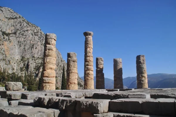 thick standing columns of the temple of apollo in delphi, greece