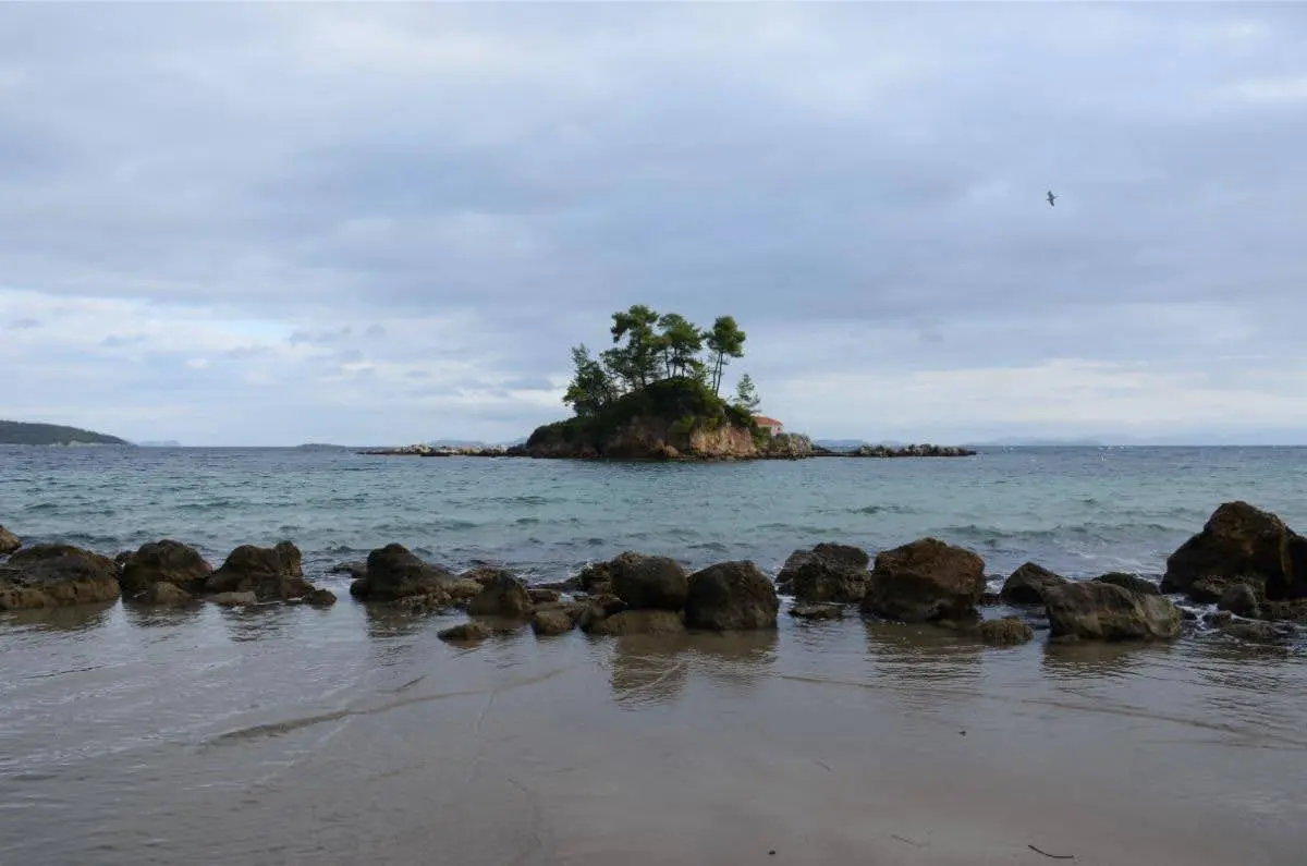 The islet of Agios Nikolaos across the beach of Ellinika in north evia