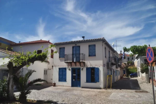 Cute blue-white old house in galaxidi, greece
