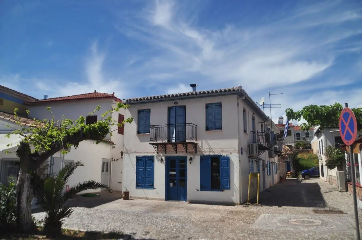 Cute blue-white old house in galaxidi, greece