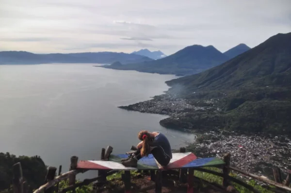 girl Enjoying a morning view of Lake Atitlán from the top indian nose viewpoint