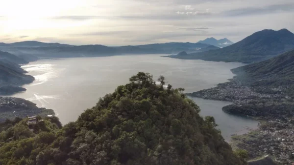 drone photo of Indian Nose peak overlooking lake atitlan in the morning
