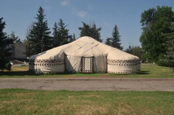 Traditional Kyrgyz yurt displayed in a public park in Karakol, Kyrgyzstan