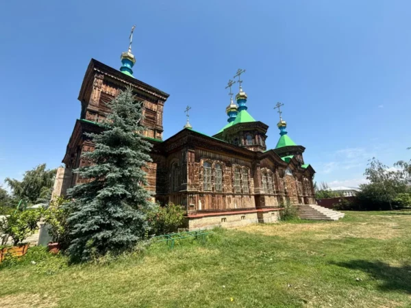 Holy Trinity Russian Orthodox Cathedral, a historic wooden Orthodox church in Karakol, Kyrgyzstan