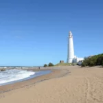 lighthouse by beach in la paloma, uruguay