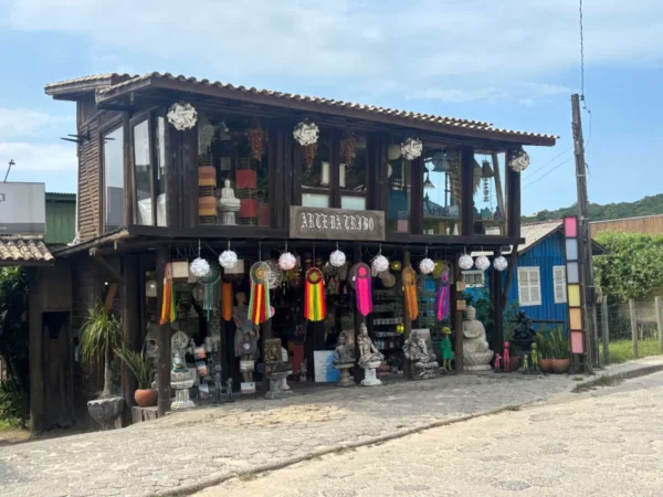 Colorful decorations and vibrant lanterns adorn the charming shop in Praia do Rosa, Santa Catarina, Brazil.