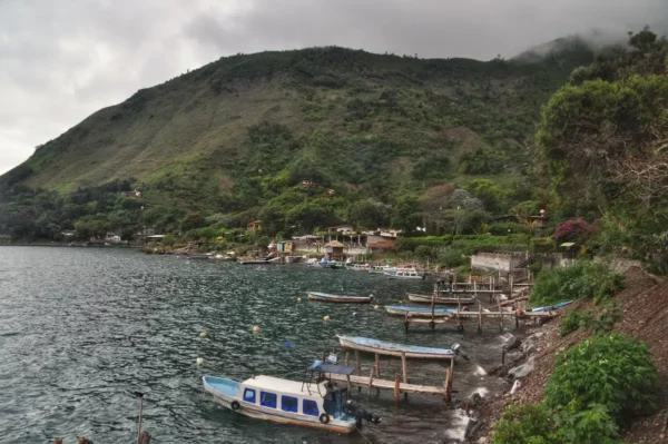 small boats and wooden piers at The waterfront of Santa Cruz la laguna, lake atitlan