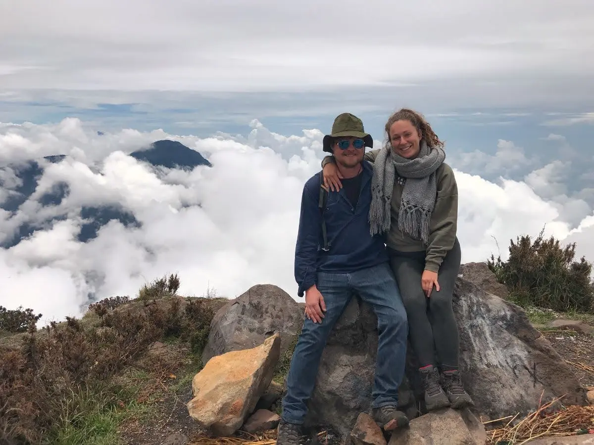 couple on top of santa maria volcano in guatemala