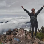 girl hiker On top of Santa María Volcano in guatemala