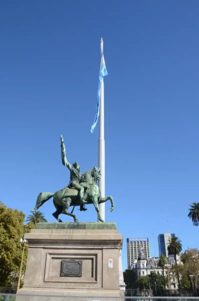 Monument of General Manuel Belgrano and gigantic Argentinian flag in Plaza de Mayo, buenos aires