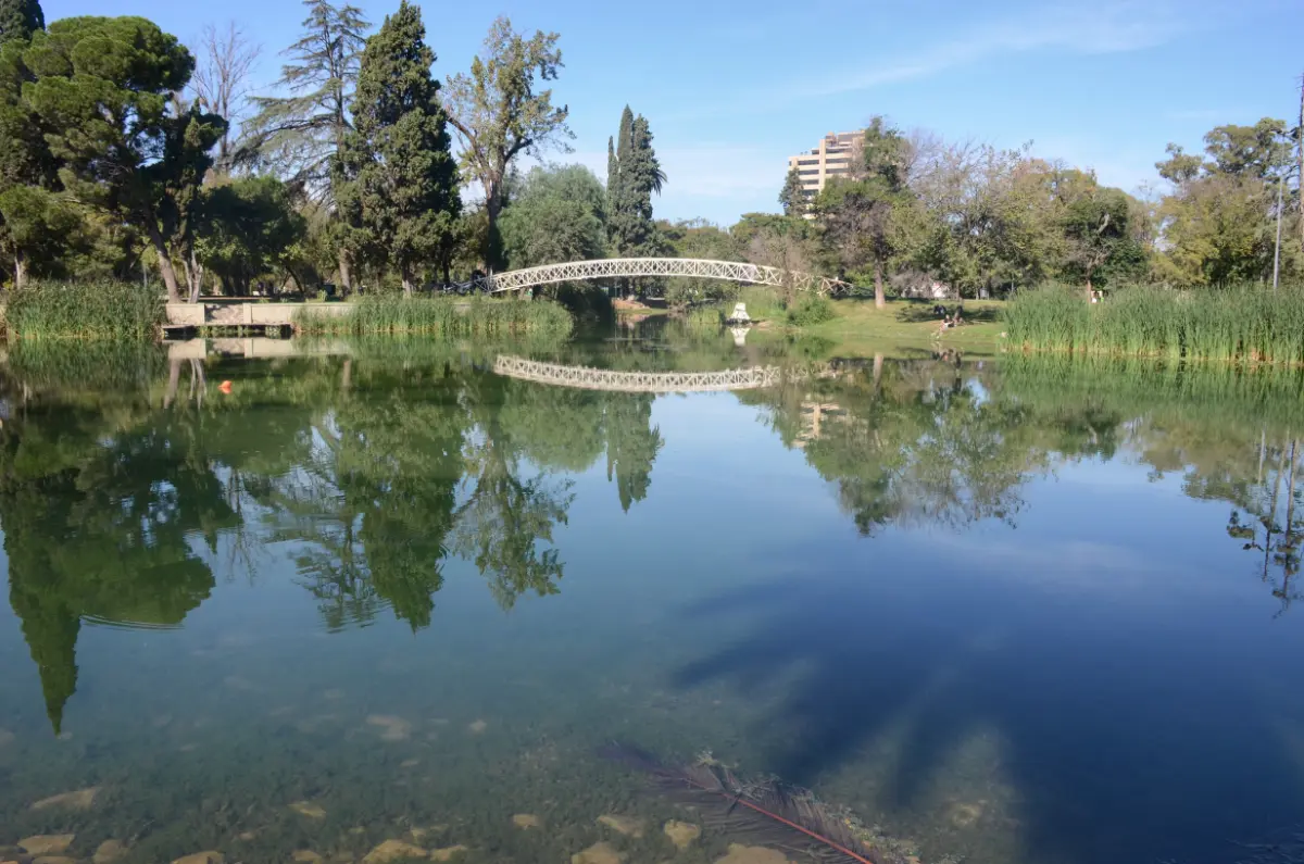 Large pond and arched bridge in Sarmiento Park, cordoba, argentina