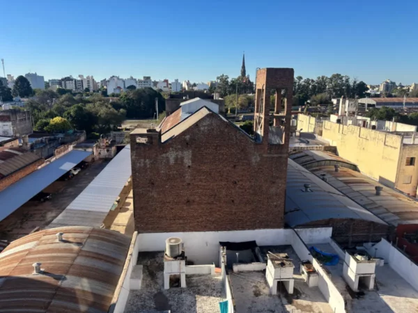 balcony view of old train station and north suburbs of cordoba, argentina