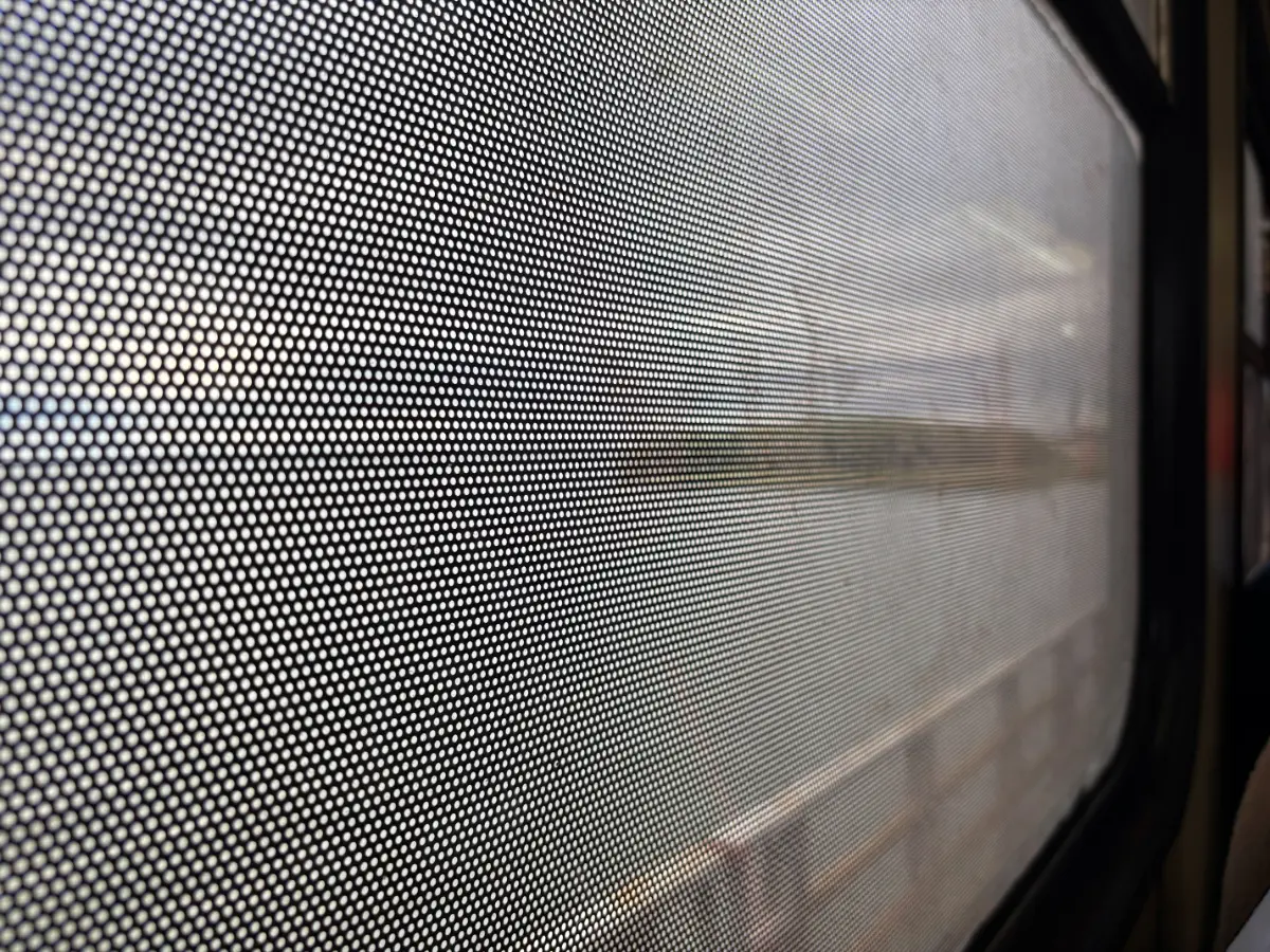 view of the parana river out of train window crossing bridge between posadas and encarnacion