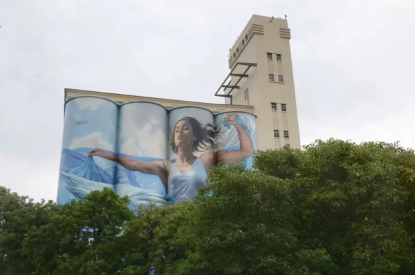 mural of girl with argentinian flag on old grain silos of the museum of contemporary arts in rosario argentina