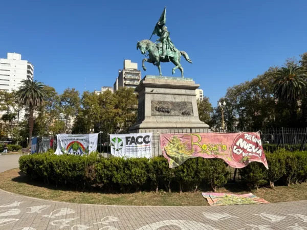 cannabis legalization banners around statue of Domingo Faustino Sarmiento on sarmiento square in rosario, argentina