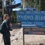sign to the hippie museum in the village of san marcos sierras in cordoba province, argentina