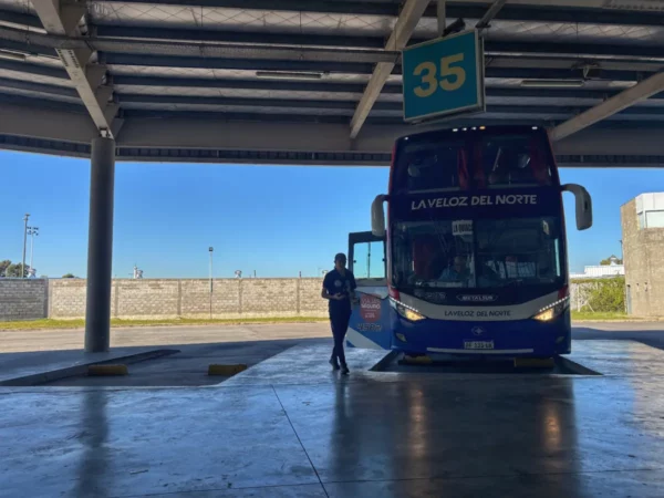 Boarding the bus to rosario on a deserted platform of dellepiane terminal in buenos aires