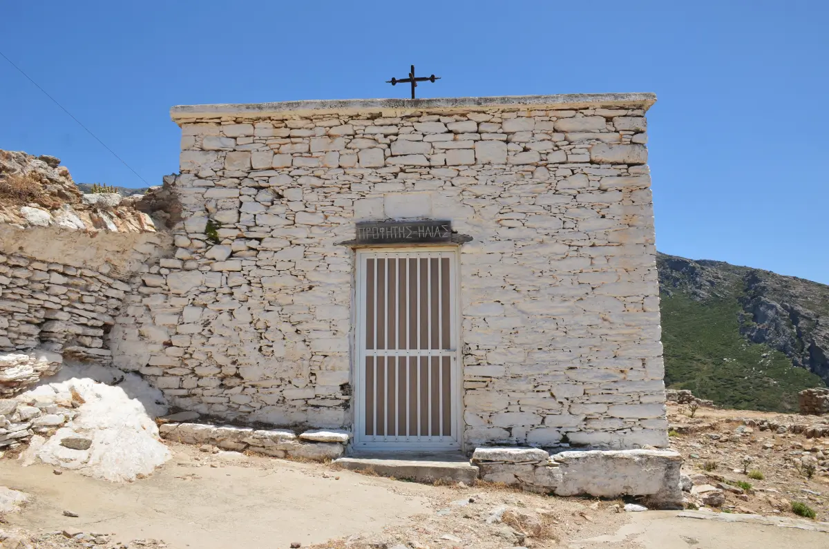 The Prophet Elias white church on the top of kokkinokastro castle in karystos