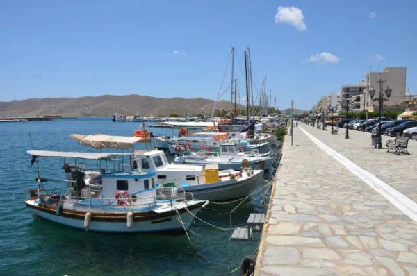 fishing boats along the coastal promenade of karystos