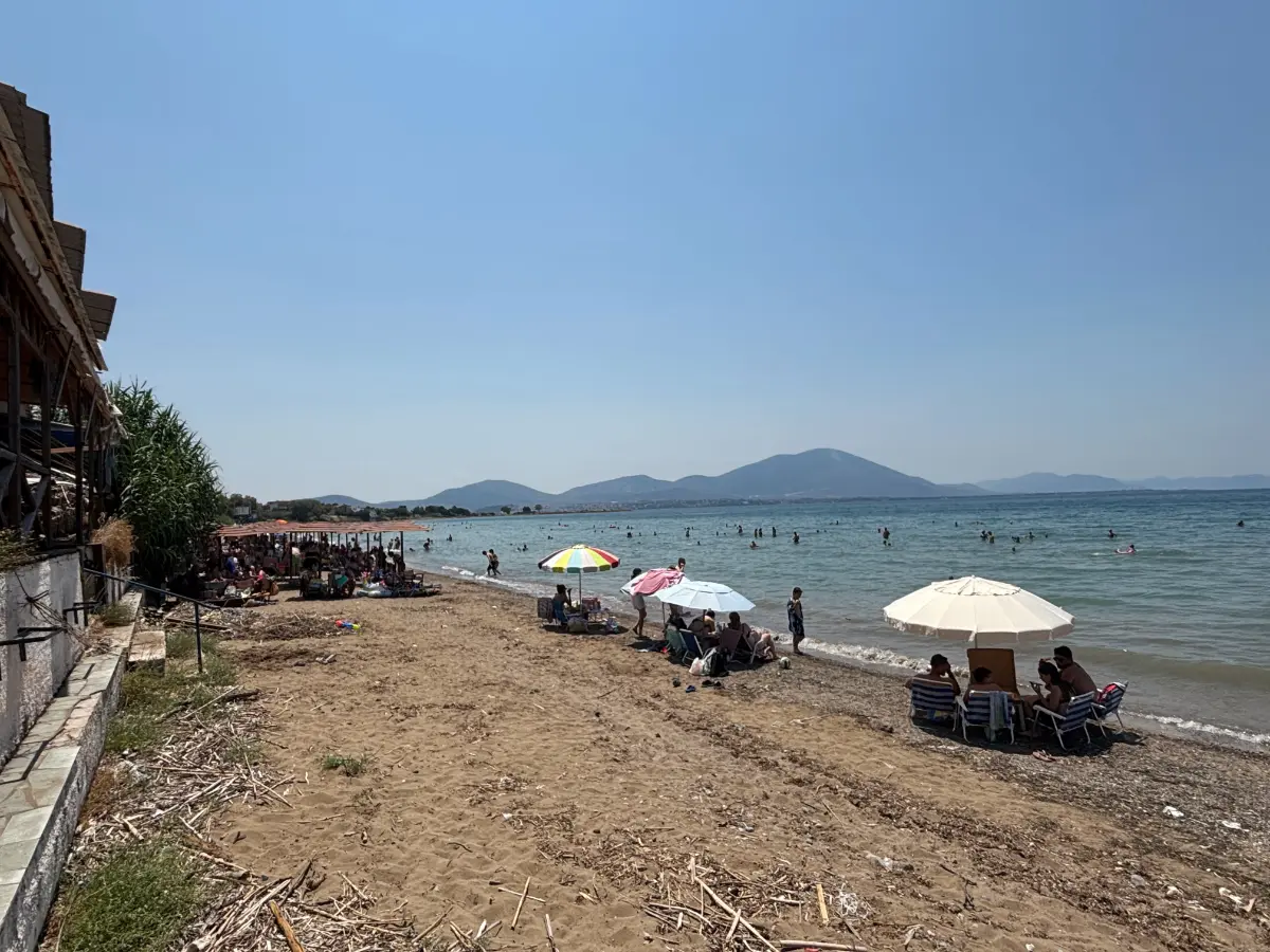 Kalami beach and view to messapion mountain in nea artaki