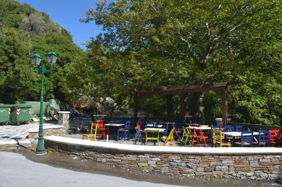 colorful tables By the parking area of platanistos waterfall in south evia
