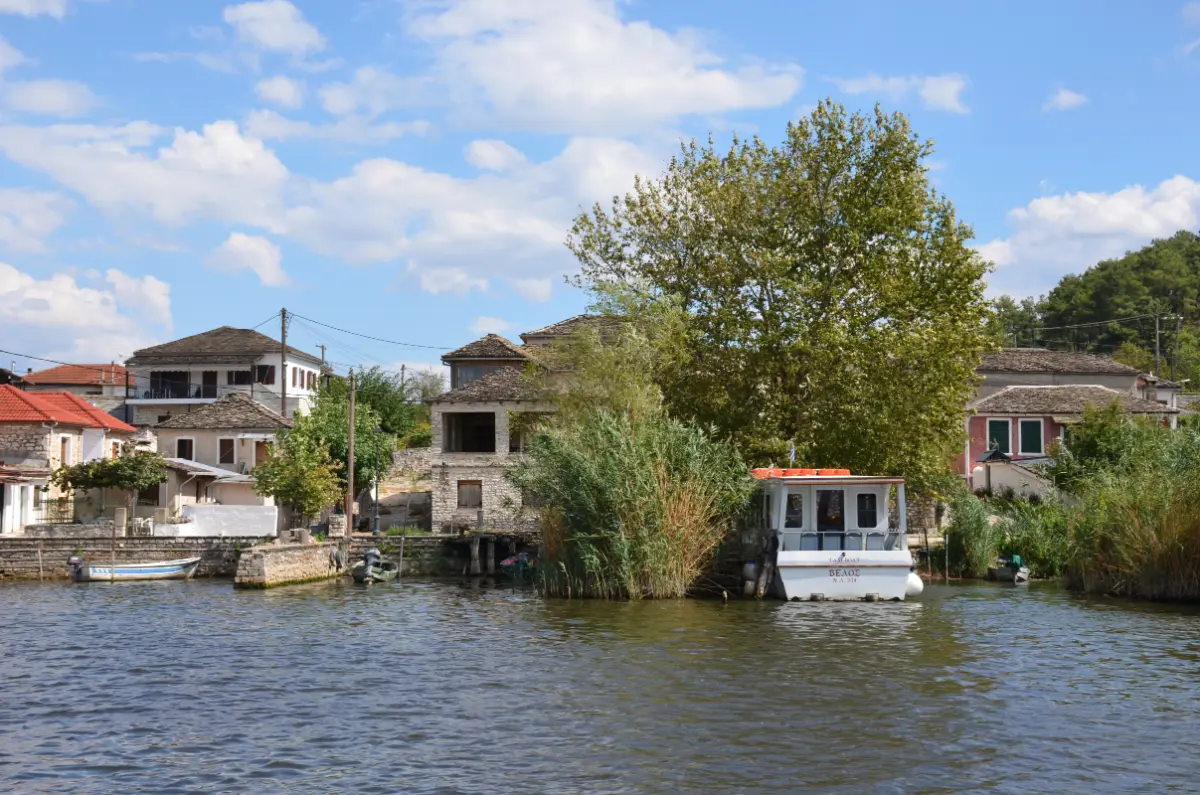 Little waterfront houses on the shore of Ioannina Island