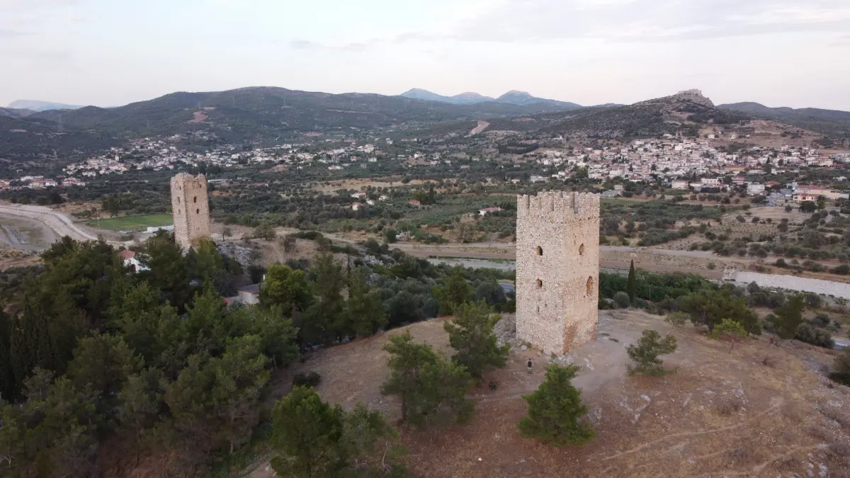twin medieval towers on hilltop near mytikas, chalkida, evia island