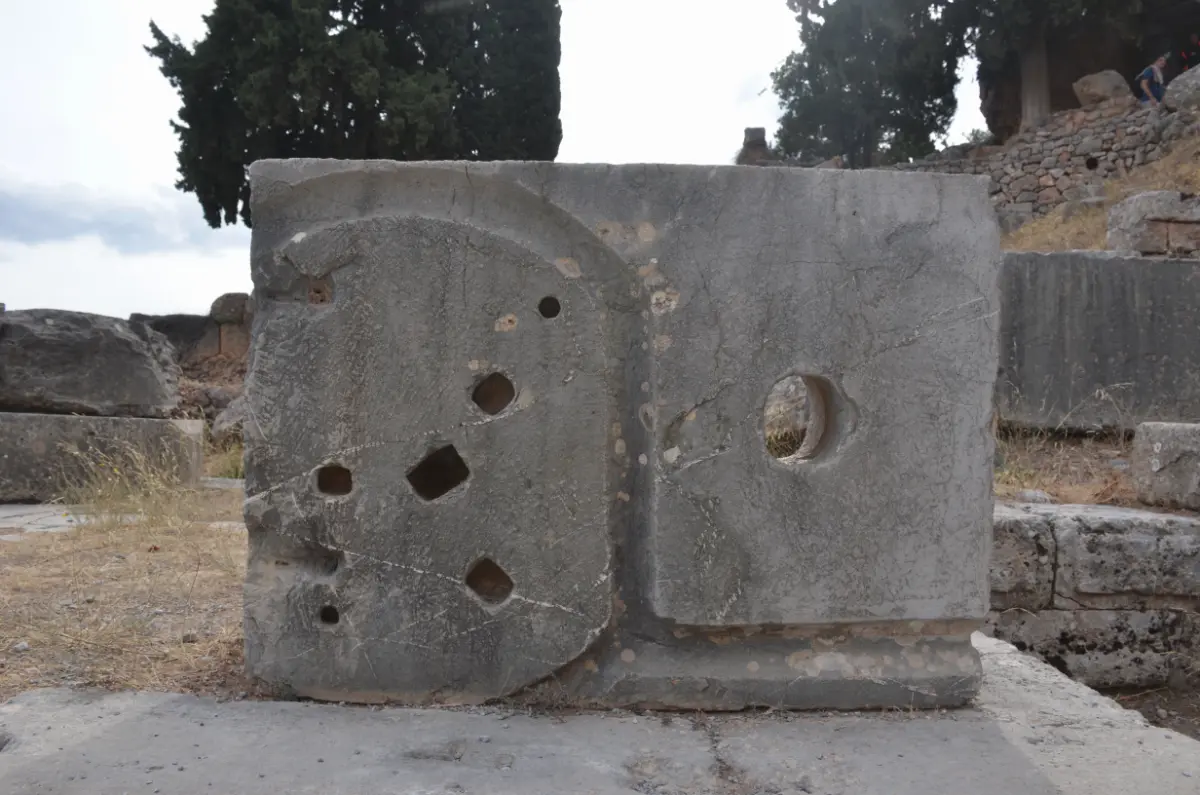 a stone in delphi with holes resembling the ursa major constellation