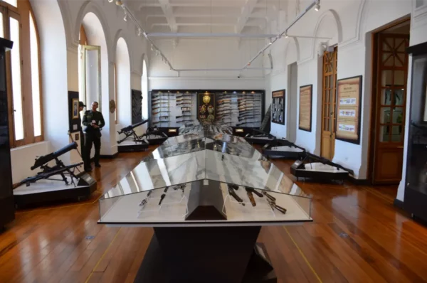 Collection of historical firearms and military weapons displayed at the Police Museum of Bogotá