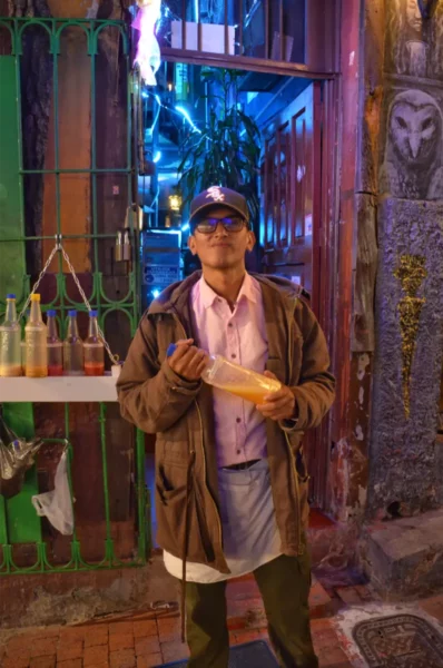 Street vendor selling chicha in Chorro de Quevedo, La Candelaria, Bogotá