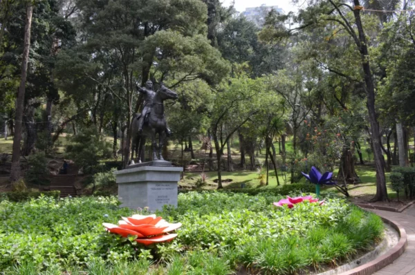 Independence Park in Bogotá with flower sculptures and mature trees