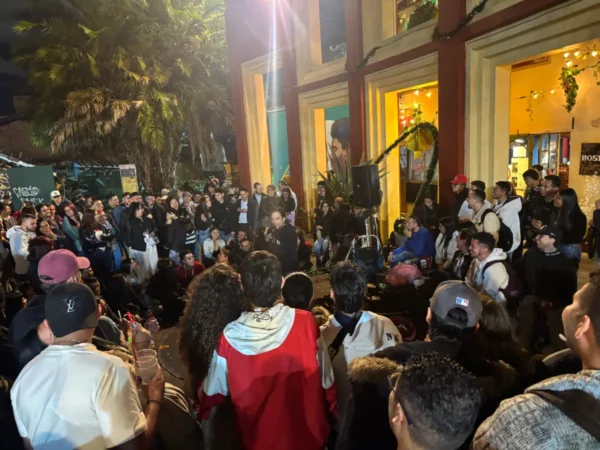 Crowd watching a cuentero performing at Chorro de Quevedo in La Candelaria, Bogotá