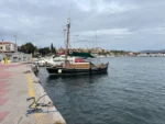 wooden sailboat on dock in lavrio town south of athens