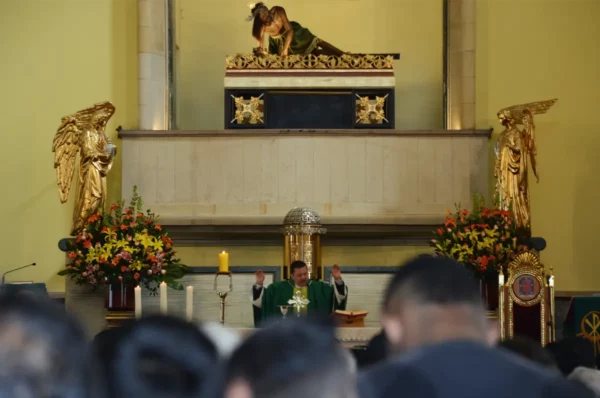 Priest celebrating Mass inside the Basílica del Señor Caído de Monserrate in Bogotá