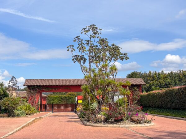 Entrance building and landscaped courtyard at the entrance to Pozos Azules, Villa de Leyva, Boyacá, Colombia