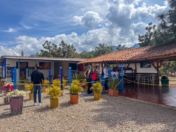 Visitors waiting outside the ticket office at Pozos Azules, Villa de Leyva, Boyacá, Colombia