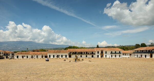 Plaza Mayor framed by whitewashed colonial buildings in Villa de Leyva, Boyacá, Colombia